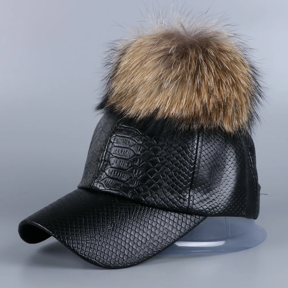 leather baseball cap with fur ball on top