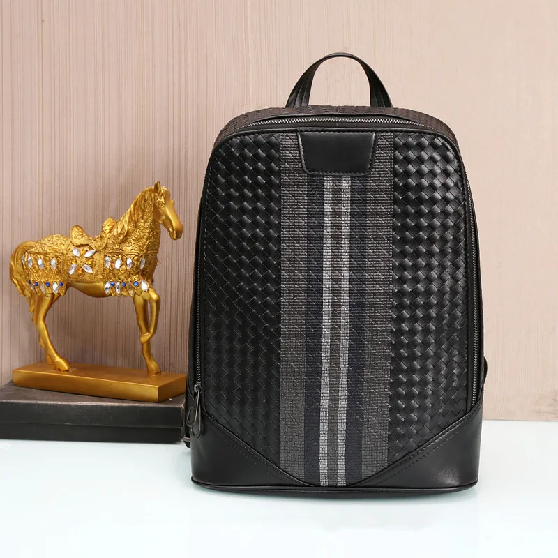 

Kaisiludi embroidery leather men's bag double shoulder bag fashion backpack head layer cowhide braid notebook computer bag