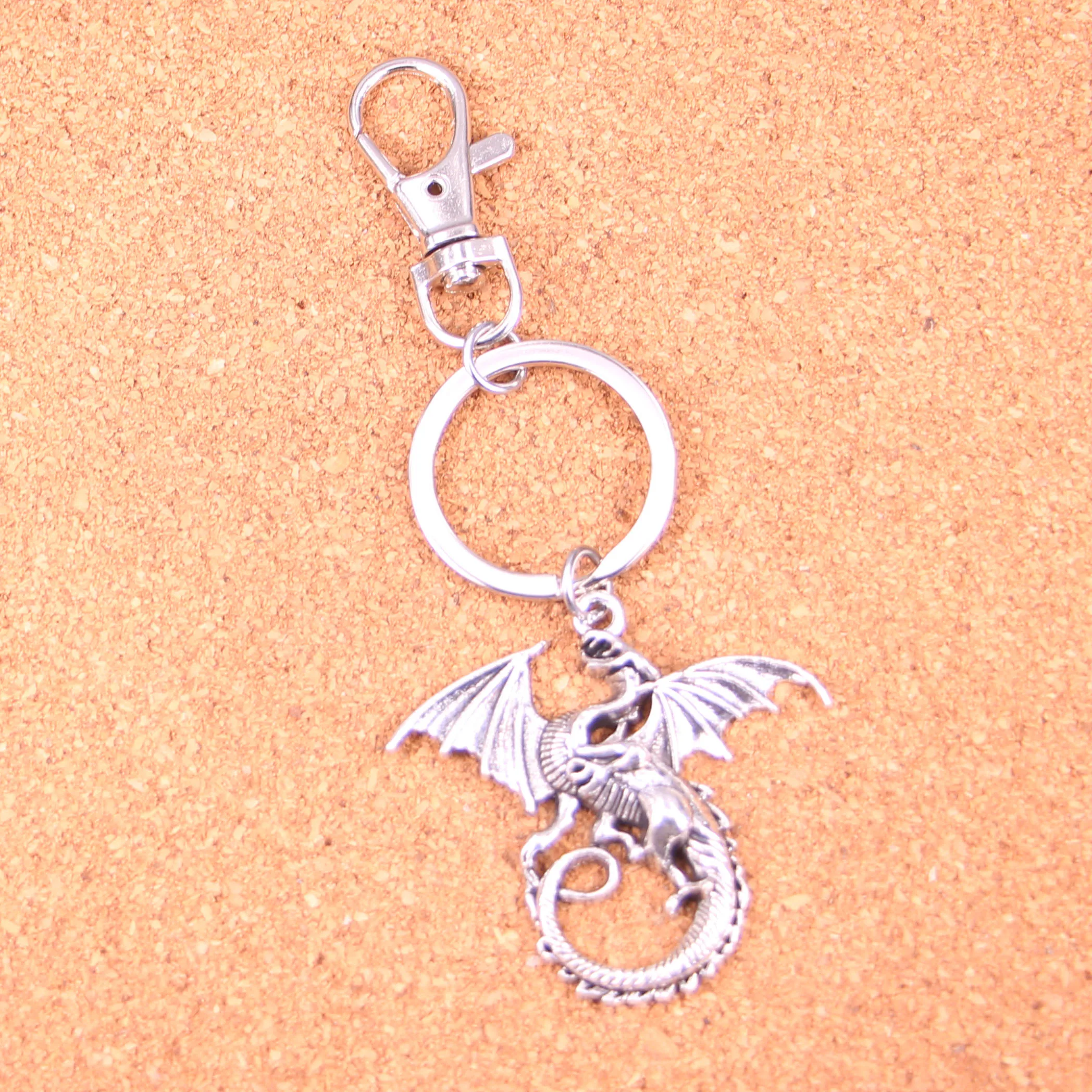 

Magical Winged Dragon Keychain Silver Swivel Lobster Clasp Clips Handbag Car Charms Jewelry For Key Chain Trinket Jewelry Gift