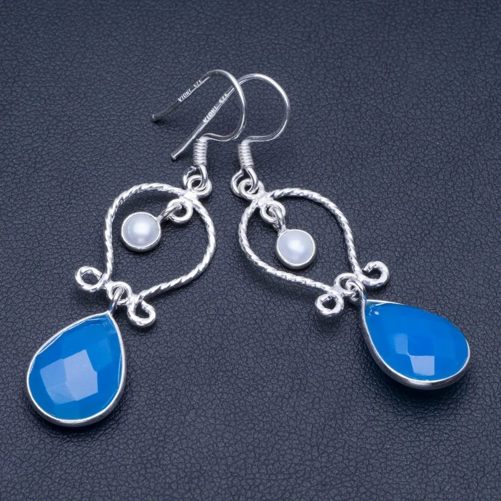 

Серьги из серебра 925 пробы с натуральным халцедоном и речным жемчугом 2 "Q1586