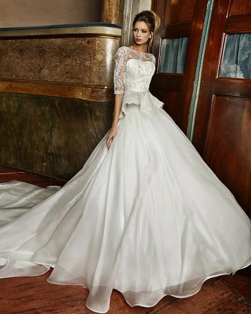 Unique Designer Bateau Neck Half Sleeve Plunging Back Long Tail Wedding