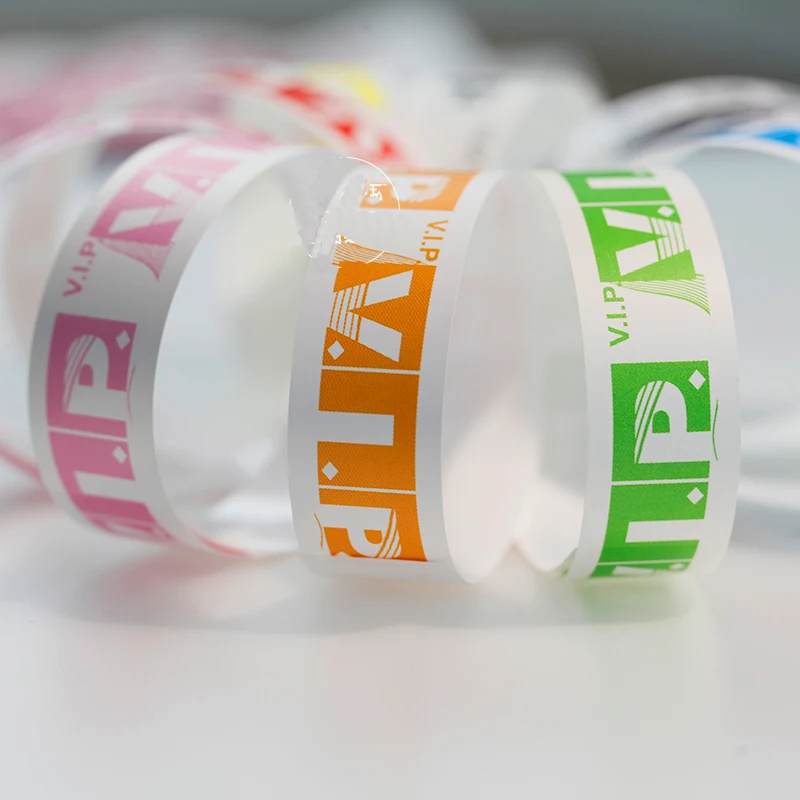 

100 Pieces Waterproof Disposable pvc paper Band toy for Events Swimming Plain Color Cheap synthetic paper Wristband Toy