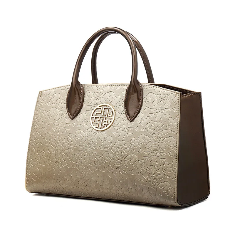 

Fashion atmosphere is trapezium luxury handbags women bags designer middle-aged mother embossed large capacity bolsa feminina