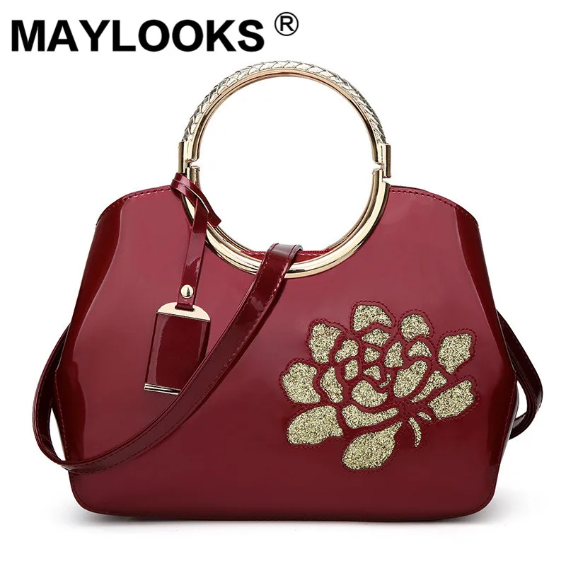 

2019 patent leather glossy face handbag bride married noble atmosphere handbag women's shoulder slung M-1316