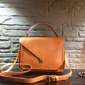 

XHTY plug lock quality leather handbag retro vegetable tanned envelope top layer cowhide 2019 new oblique professional commuter