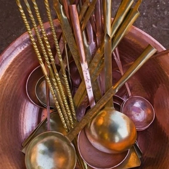 Metal spoons  Lijiang Market  Lijiang  Yunnan Province  China Print by Walter Bibikow (11 x 17)