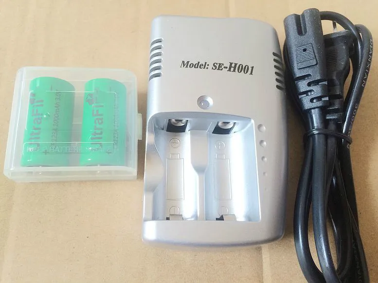 

3V CR123A Charger + 2 pcs. New 3V 16340 rechargeable battery section CR123A Charger;Free Shipping +