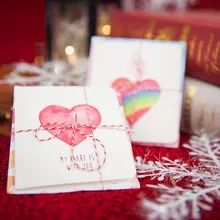 1 paquete/lote romántico Mini Corazón de amor conjunto de tarjetas de felicitación y sobre con cuerda para la decoración de la boda de la fiesta de cumpleaños deseos regalos(China)
