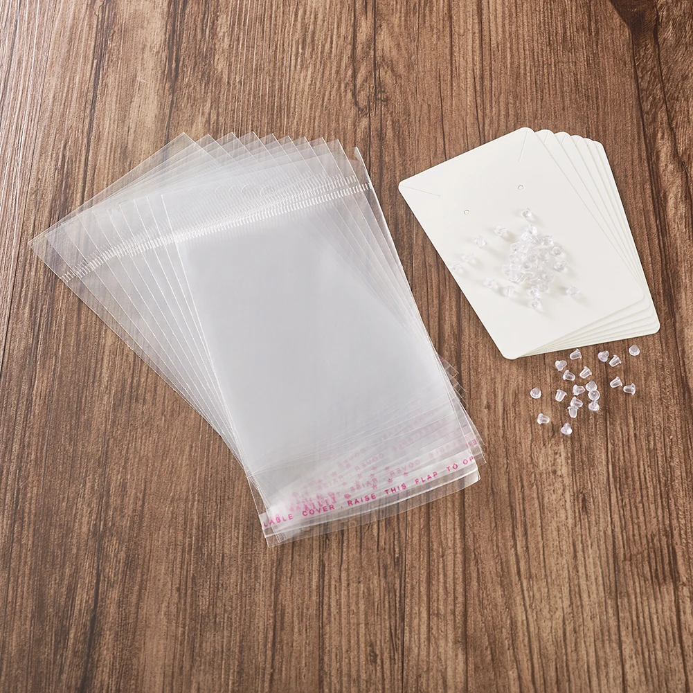 Pandahall 100 шт бумажные серьги карты-стойки для ювелирных изделий с пластиковыми фиксаторы для серег и целлофановые ОПП пакеты, 90x60x0,1 мм, отверстие: 1~ 5 мм