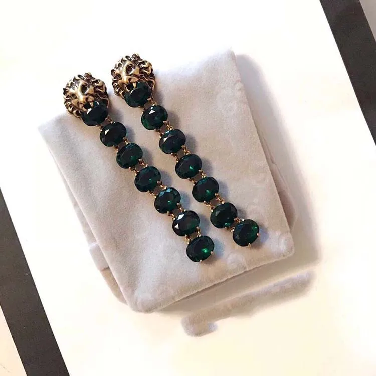 

High quality fashion sterling silver earrings lion head seven green Rhinestone inlaid long earrings luxury ladies jewelry