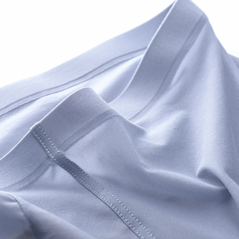 Hot-Man-Ice-Silk-Sexy-Underwear-Thin-Breathable-Soft-Male-Boxer-Shorts-Seamless-Transparent-Solid-Men (1)