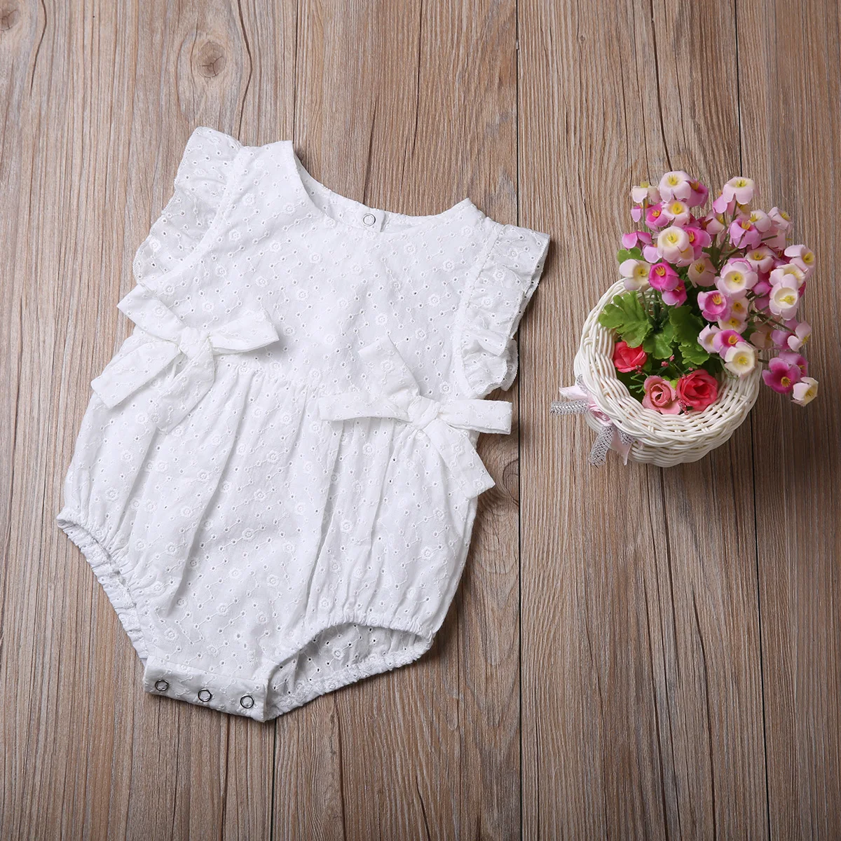Милый комбинезон с цветочным рисунком для новорожденных девочек; одежда с бантом; цельнокроеный комбинезон; одежда для маленьких девочек; короткие комбинезоны без рукавов