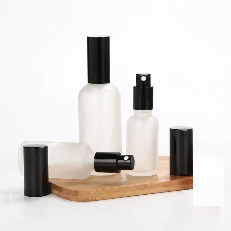 

50 pcs Glass Spray Bottle Cosmetic Packaging Empty Frost Glass Vial Essence Oil Lotion Pump Bottles 15ml 20ml 30ml 50ml 100ml