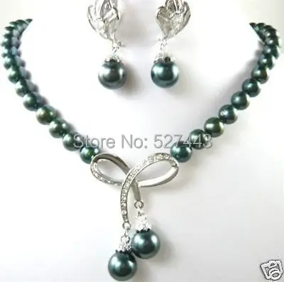 

Wholesale free shipping >>New beautiful black pearl Pendant Necklace earring sets