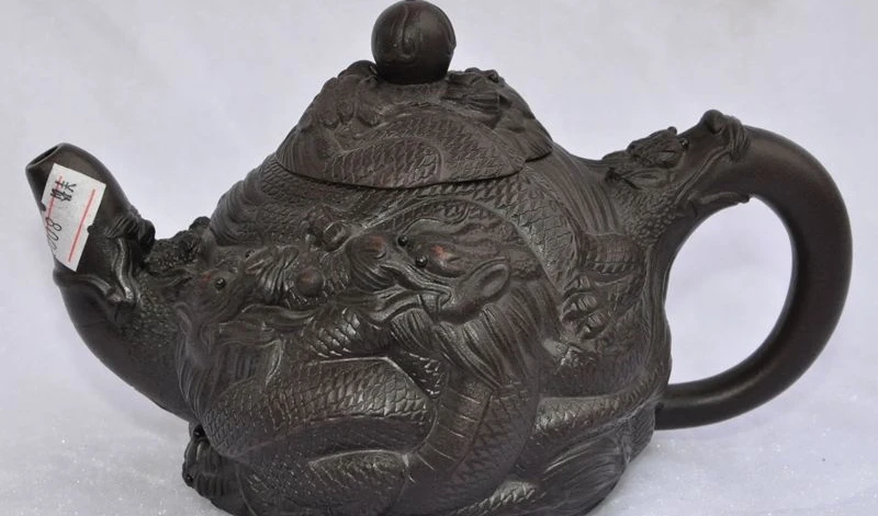 

7" chinese yixing zisha pottery carved 9 dragon play bead statue TeaPot Tea set