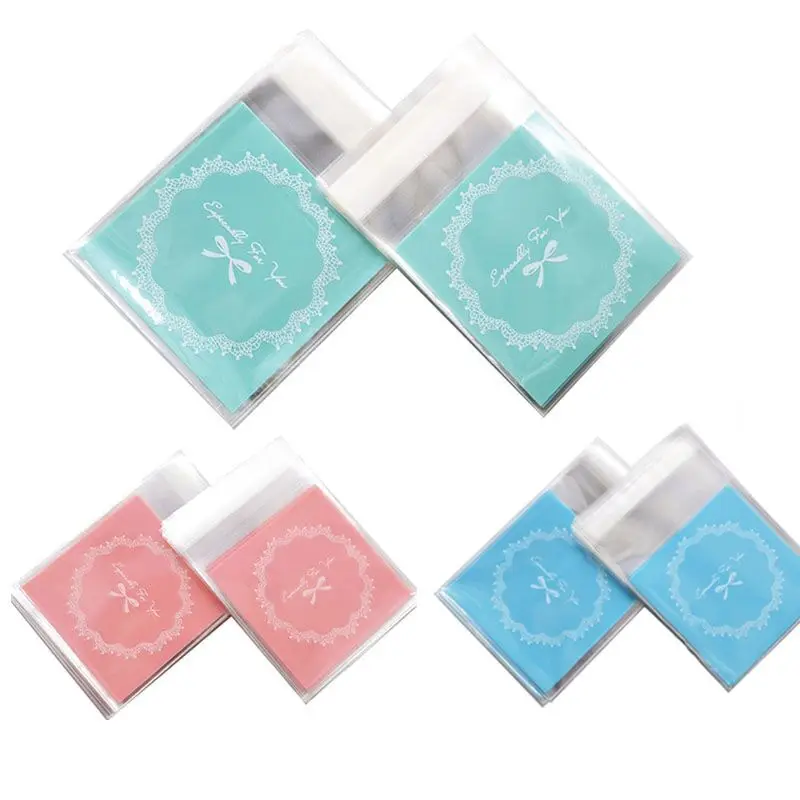 

50pcs Bow Decor Plastic Packing Bags Self Adhesive Candy Cookie Biscuits Snack Bag fDIY or Home Wedding Party Gift Bag