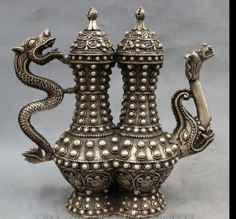 

67111631+++8" Chinese Silver Buddhist Dragon Head Statue Siamesed Globules Wine Pot Teapot