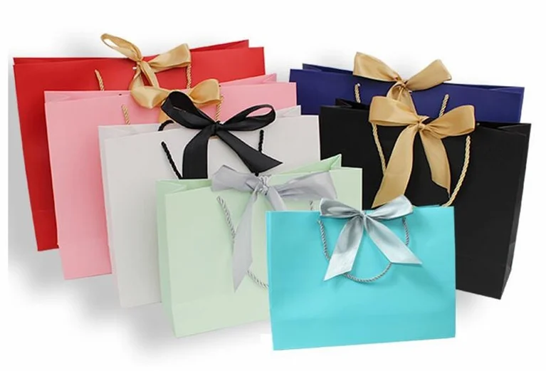 50 個卸売プレゼントバッグパジャマ服本包装袋大紙ショッピングバッグクラフト紙のギフトバッグハンドル ギフトバッグ ラッピング用品 Aliexpress