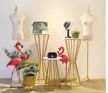 Special Price Clothing store window decoration props display rack Creative women's clothing store Golden Window exhibition stand. Special Price Clothing store window decoration props display rack Creative women's clothing store Golden Window exhibition stand.
