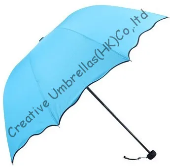 

Water flower printed,90T pongee,100%sunshade, colour changing,arched shape manual umbrellas,three fold,fashional virgin parasols