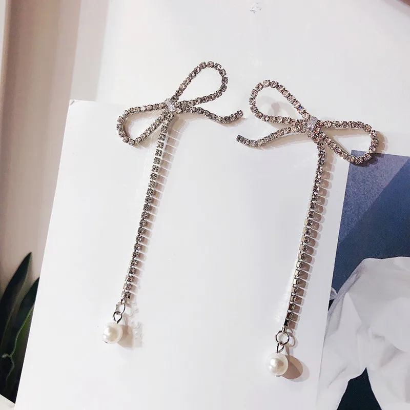 

Dominated 2019 New Unsymmetrical Metal Bowknot Earrings Fashion crystal pearl Long Women Drop earrings