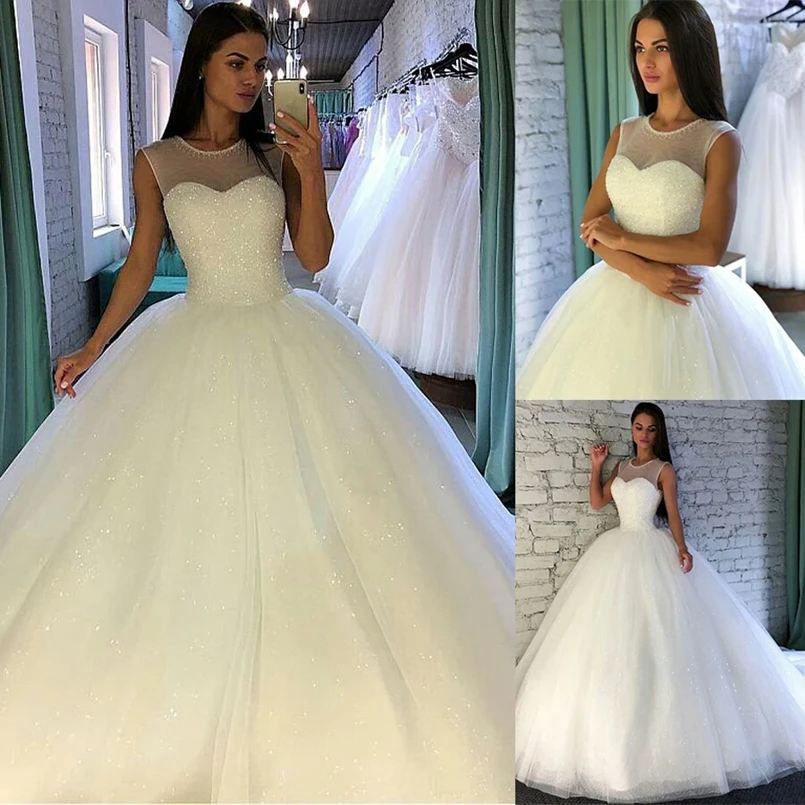 

Crystal Beaded Floor Length White Ball Gown Wedding Dress Sheer Neck Sleeveless Tulle Sequins Wedding Gown Gelinlik