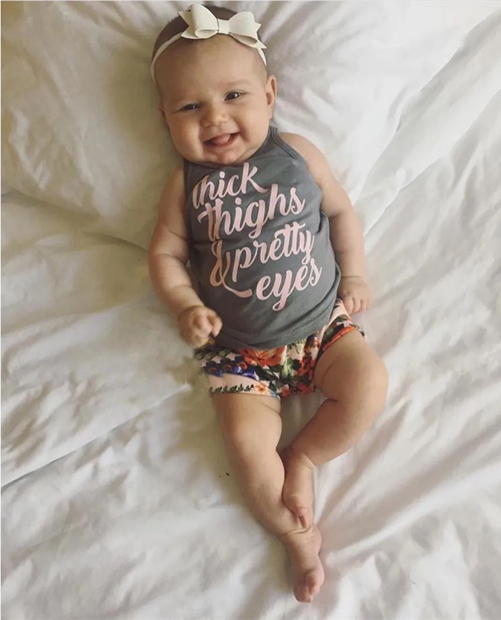 thick thighs and pretty eyes onesie