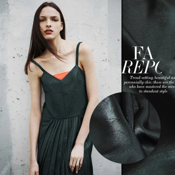 

The new listing of black color like the noble and elegant light pale Turquoise burst crack linen blended fabric imported fabric