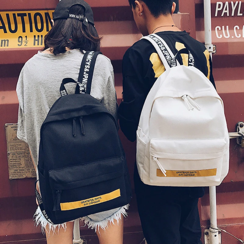 

2019 Summer New Hot Fashion Women Female Casual Zipper Letters Korean School bags Simple Canvas Man Male Backpacks Bags
