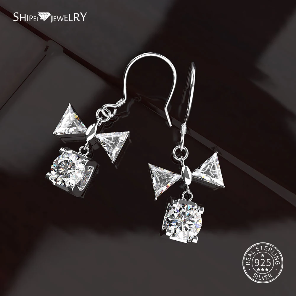 

Shipei 100% Sterling Silver White Sapphire Geometric Drop Earrings White Gold Bowknot Hook Earrings for Women Fine Jewelry