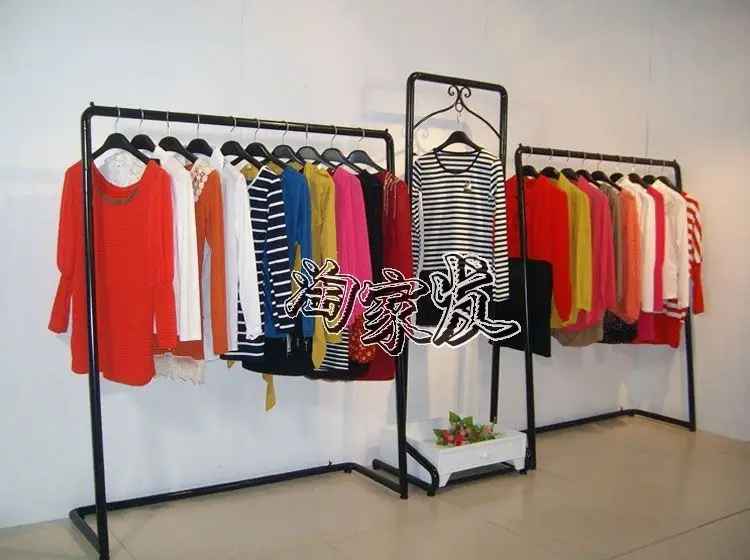 

Clothing store display shelf hangers clothing rack clothes rack clothes rack clothing floor in the island shelf