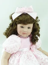 Muñeca reborn de 55 cm con lazo rosa