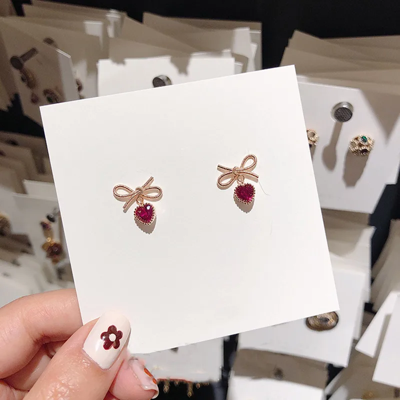 

Dominated new 2019 fashion metal bowknot Stud earrings Contracted personality Heart crystal Women earrings