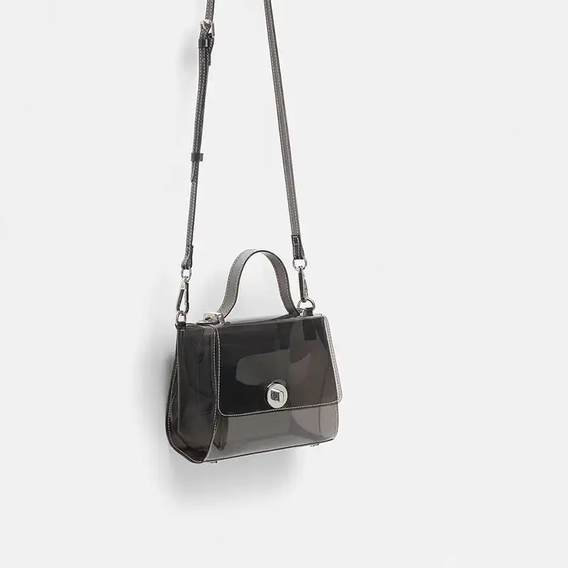 black vinyl crossbody bag