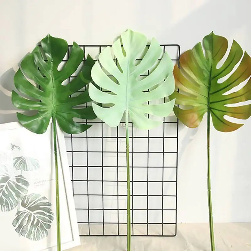 

Artificial Tropical Palm Leaves Plants Large Artificial Fake Monstera Palm Tree Leaves Green Plastic Leaf for Home Decoration