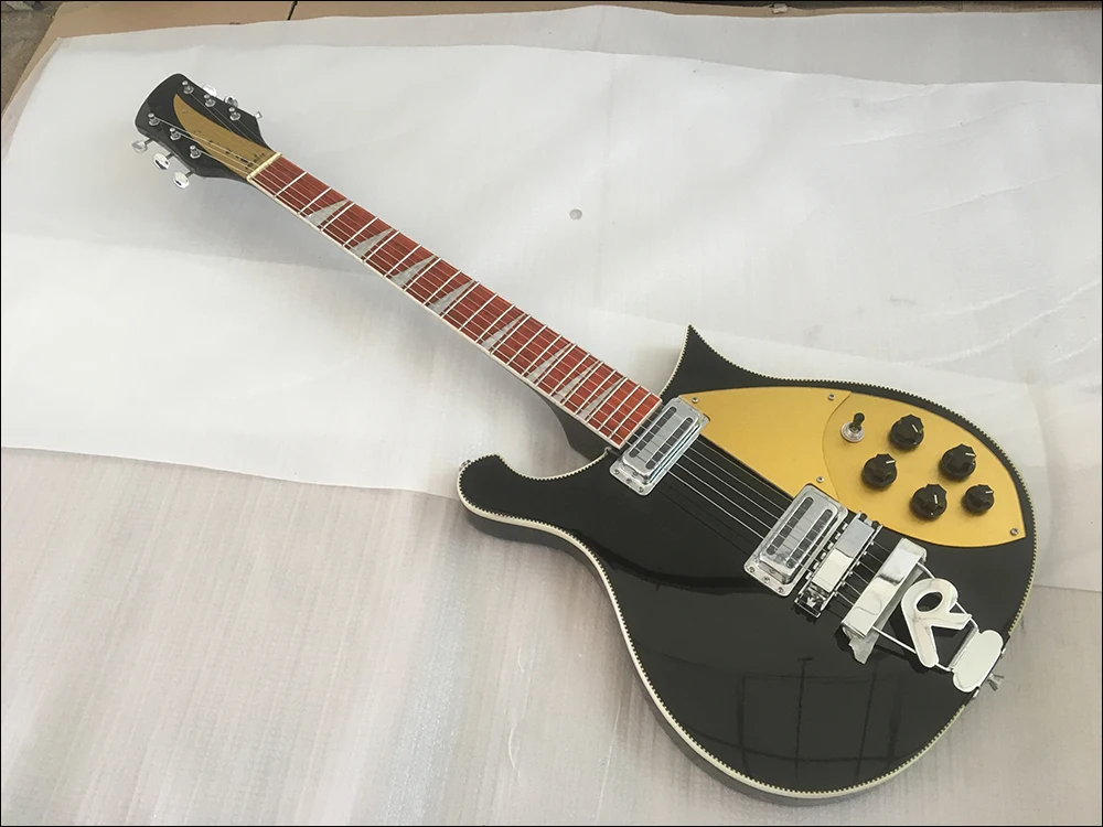 

2018 New Electric Guitar,rosewood fingerboard has the gloss of varnish on it,headstock 5 degrees,rich neck thru body!