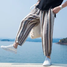 Pantalones holgados de pierna ancha con estampado a rayas para hombre, pantalones bombachos de longitud de pantorrilla con decoración de botones, chándal de hip hop de talla grande 5XL