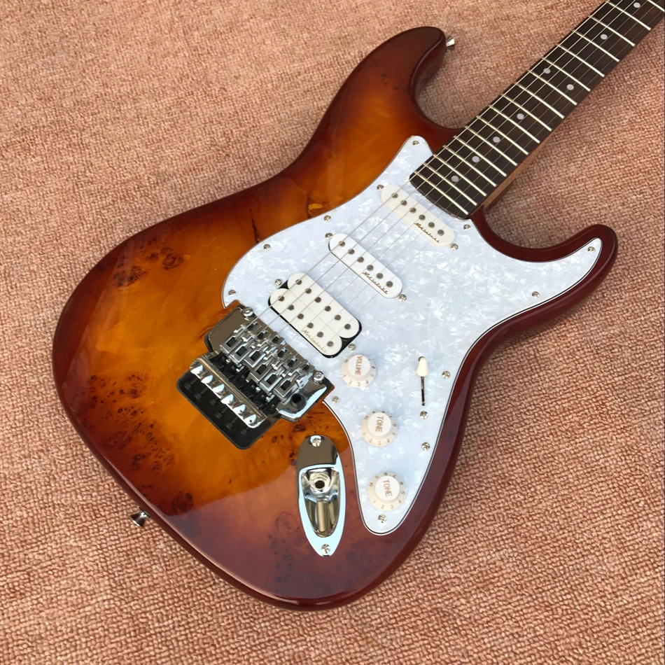 

Brown electric guitar with white pearl pickup, SSH pickup, rosewood fingerboard, Floyd Rose, customized service