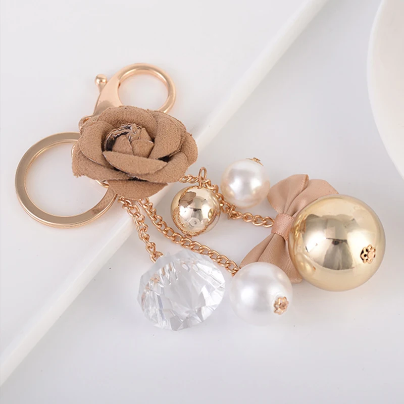 

Fashion Handmade Leather Rose Flower Keyring Bowknot Keychain Women Handbag Pendant Crystal Pearl Beads Key Chains llaveros Gift