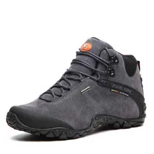Últimas xiangguan marca caliente al aire libre a prueba de agua en forma de bota botas red zapatos para caminar para los hombres trend zapatos de trekking zapatillas deportivas