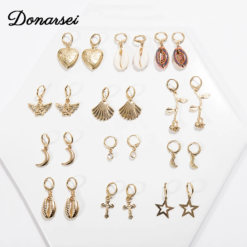 

Donarsei 2019 New Fashion Sea Shell Dangle Earrings For Women Angel Star Rose Flower Cross Heart Drop Earrings Ear Clip