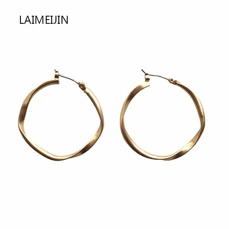 

Vintage Earrings Personality Simple Circular Spiral Twist Earrings Women New Geometric Round Fashion Jewelry Hoop Earrings Gifts