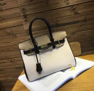

AAA New 2018 Korean version of the bag, fashion bag, lychee stripes platinum Bag Satchel