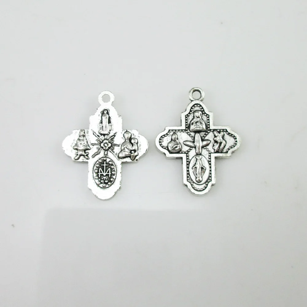 

100pcs of 4 Way Cross Medal with Holy Spirit