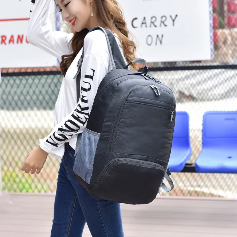 

Backpack han edition tide female male students travel bag backpack portable foldable bag pack waterproof skin