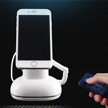 CJ7000 white color shining abs cellphones tablets charger holder with alarm function in retail shop security