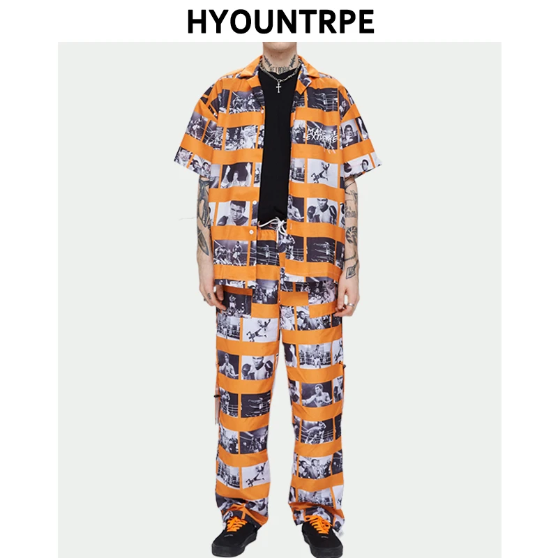 

2 Pieces Sets Men Fashion Graphic Printed Short Sleeve Shirts Streetwear And Drawstring Elastic Waist Joggers Pants Hip Hop Set