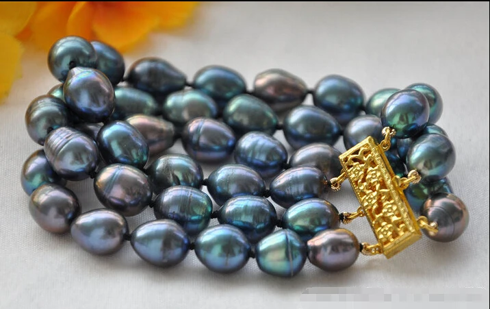 

Free shipping >>>>>>z5213 3strands 12mm rice peacock black Freshwater cultured pearl bracelet