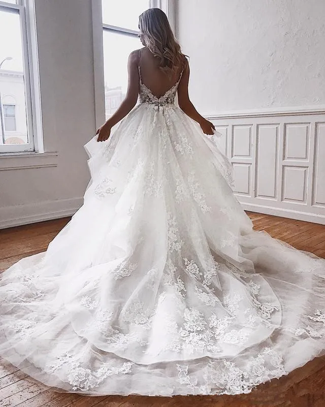 2019-amazing-a-line-lace-backless-wedding-dresses-v-neck-beaded-beach-bridal-gowns-sweep-train-tulle-appliqued-boho-vestidos-de-noiva (1)
