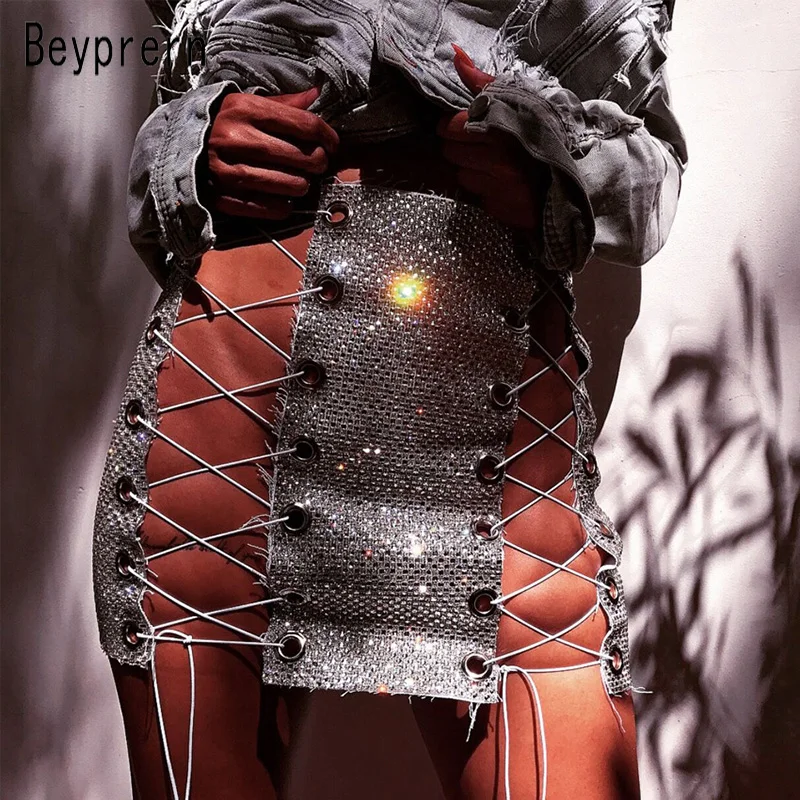 

Beyprern Sexy Hollow Out Metal Crystal Diamonds Mini Skirt Sparkle Glitter Crystal Sequins Bandage Lace Up Pencil Skirt Clubwear